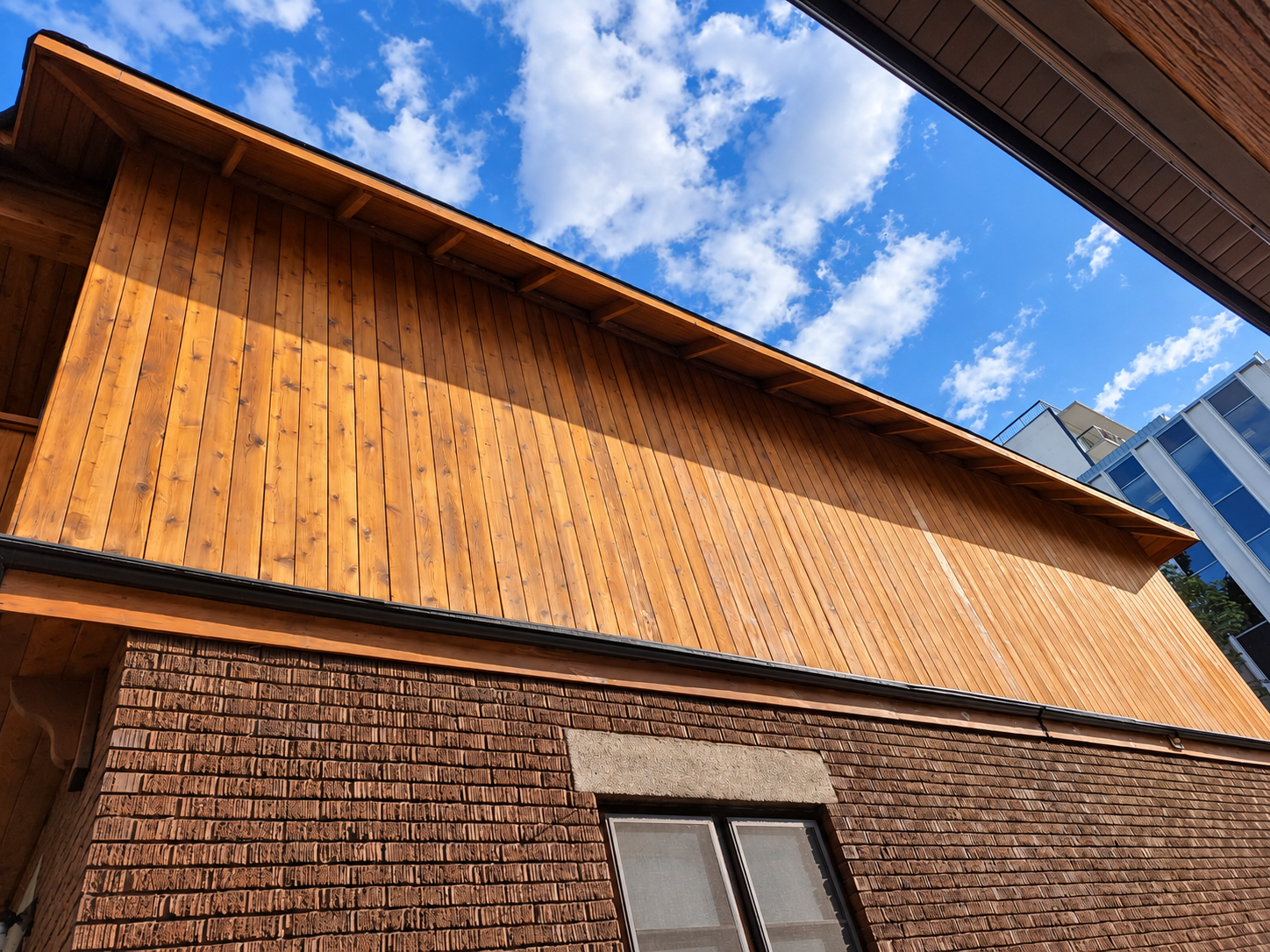 Completed cedar exterior cladding in natural sunlight